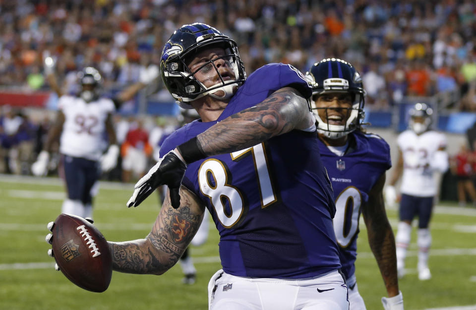 Baltimore Ravens tight end Maxx Williams celebrates after scoring against the Chicago Bears during the first half of the Pro Football Hall of Fame NFL preseason game Thursday, Aug. 2, 2018, in Canton, Ohio. (AP Photo/Ron Schwane)