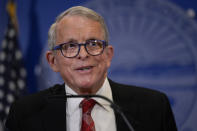 Ohio Gov. Mike DeWine speaks during a news conference, Friday, Dec. 29, 2023, in Columbus, Ohio. DeWine vetoed a measure Friday that would have banned gender-affirming care for minors and transgender athletes’ participation in girls and women’s sports, in a break from members of his party who championed the legislation.(AP Photo/Carolyn Kaster)