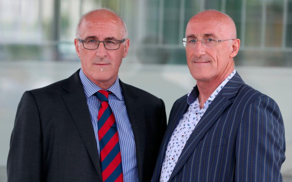 Haemophiliac twins Nigel (left) and Simon Hamilton, who contracted Hep C as a result of contaminated blood product, attend the UK's Infected Blood inquiry in Belfast