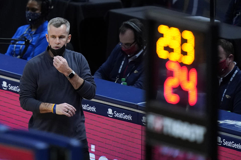 Chicago Bulls coach Billy Donovan walks along the bench area during the second half of the team's NBA basketball game against the New Orleans Pelicans in New Orleans, Wednesday, March 3, 2021. (AP Photo/Gerald Herbert)