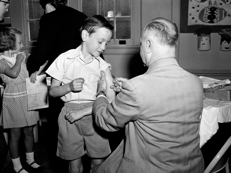 A boy getting the polio vaccine