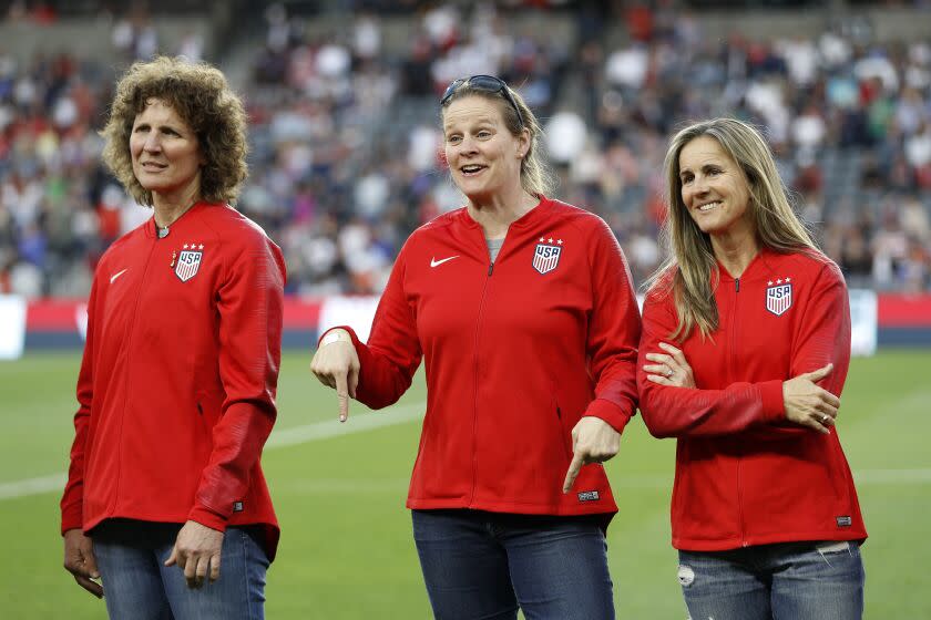 LOS ANGELES, CALIFORNIA - APRIL 07: World Cup champions Michelle Akers, Cindy Parlow Cone.