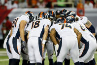 ATLANTA, GA - SEPTEMBER 17: Quarterback Peyton Manning #18 of the Denver Broncos calls a play in the huddle against the Atlanta Falcons during their game at the Georgia Dome on September 17, 2012 in Atlanta, Georgia. (Photo by Kevin C. Cox/Getty Images)