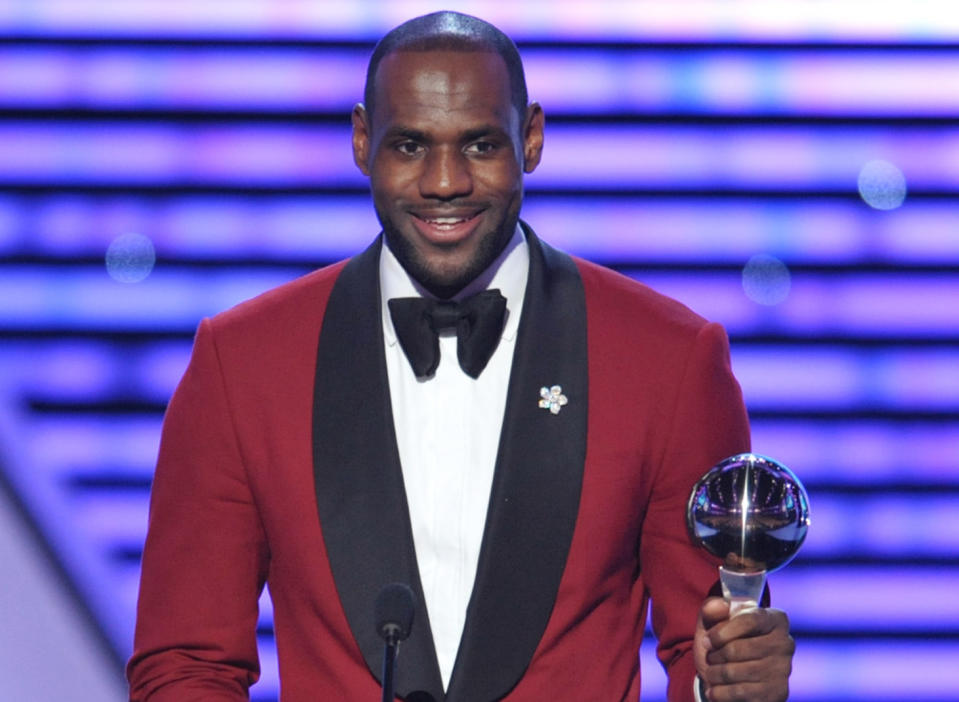 FILE - In this July 17, 2013 file photo, LeBron James accepts the award for best male athlete at the ESPY Awards at Nokia Theater, in Los Angeles. James is joining forces with Starz and the man behind classic shows like “The Cosby Show” to create a sitcom that will touch on something he knows a lot about _ “Survivor’s Remorse.” (Photo by John Shearer/Invision/AP, File)