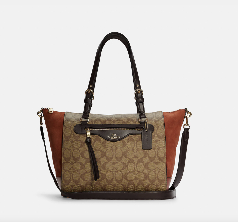 Coach Outlet Kleo Carryall In Signature Canvas Gold/Khaki Multi (Photo via Coach Outlet)
