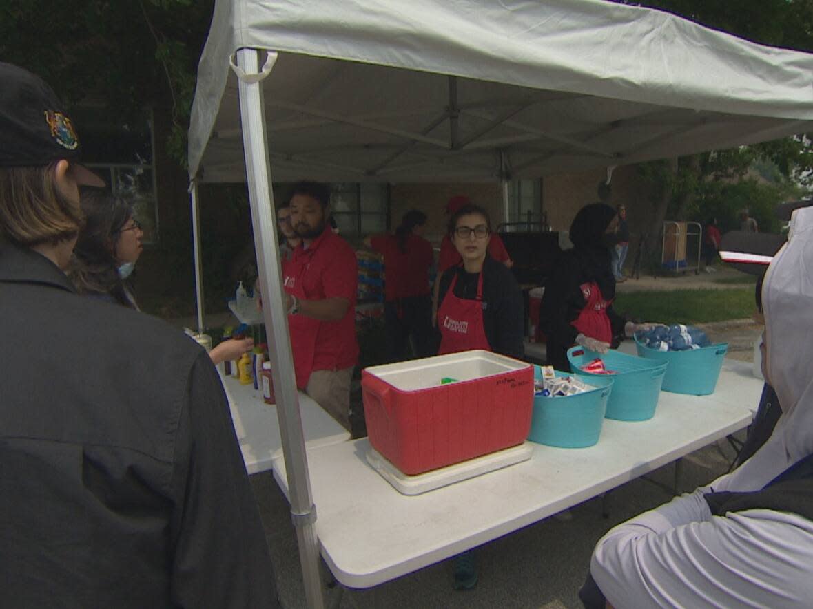 The barbecue, organized by the North York Harvest Food Bank, drew dozens of people in the ward of York South Weston. (CBC - image credit)