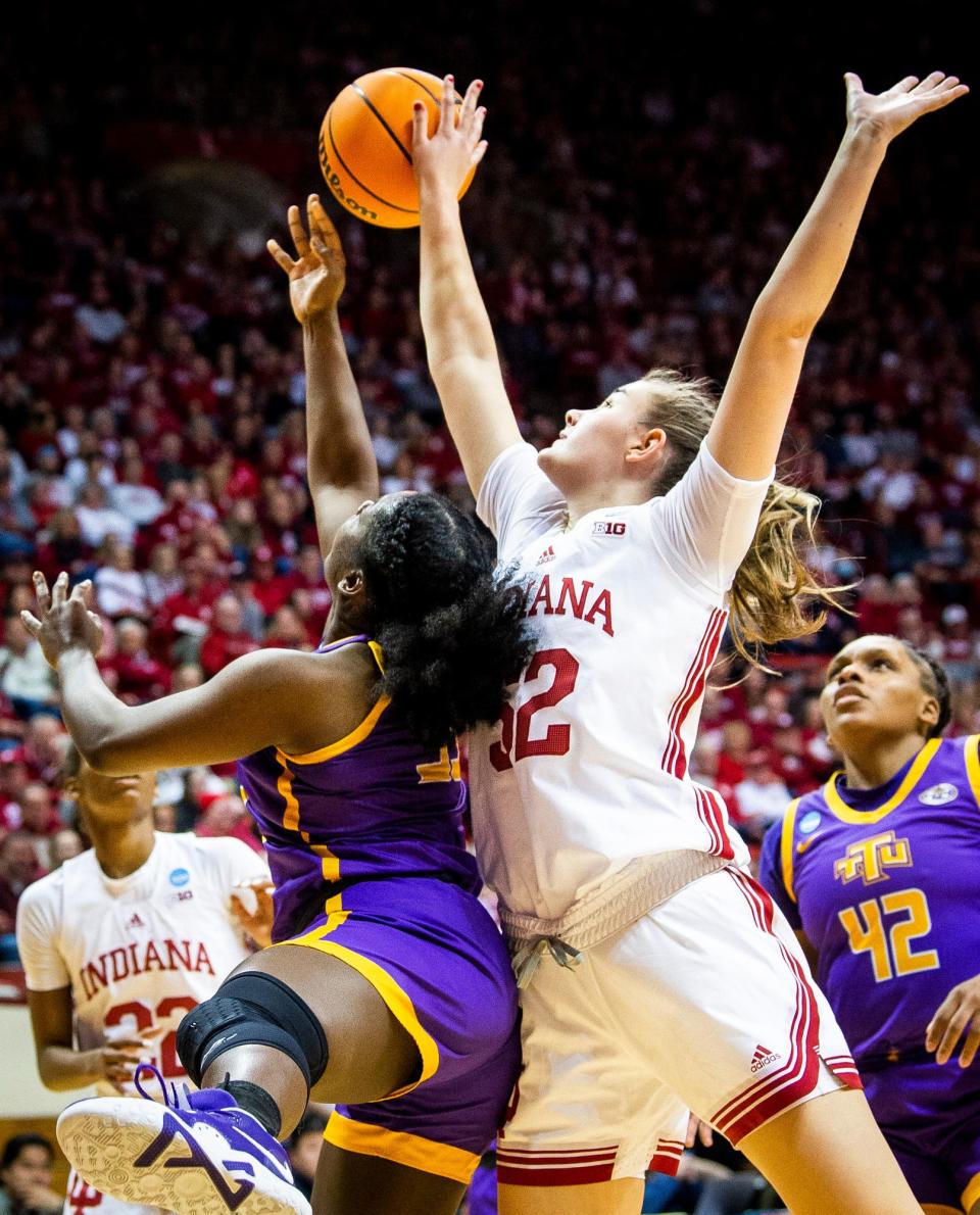 Indiana's Lilly Meister (52) blocks Tennessee Tech's Reghan Grimes (33) during the first round of the NCAA women's tournament at Simon Skjodt Assembly Hall on Saturday, March 18, 2023.