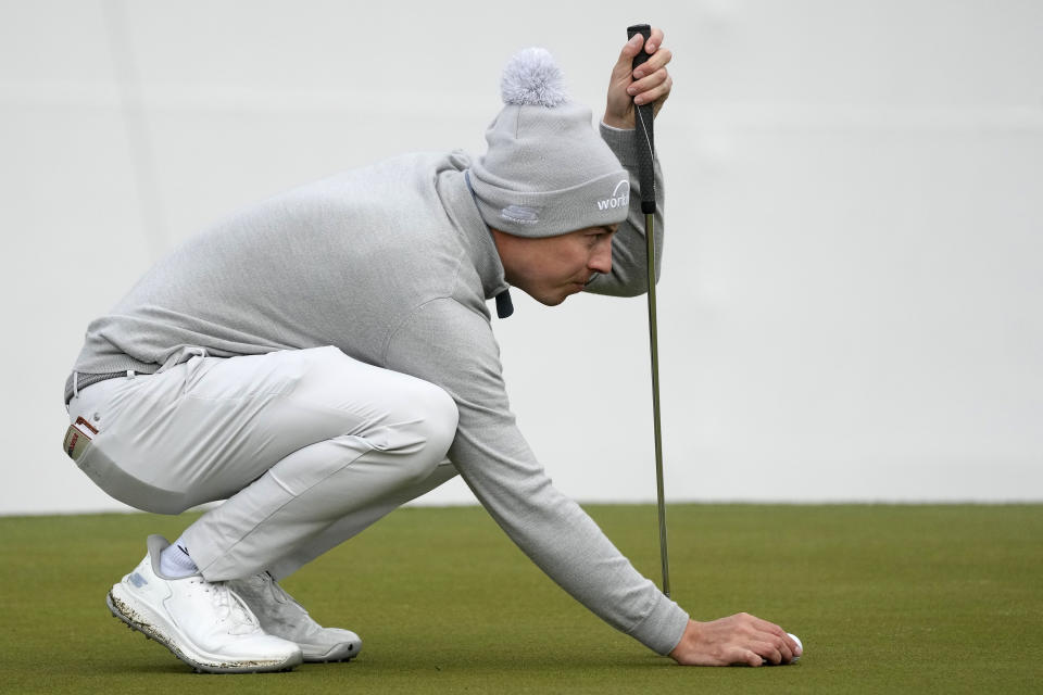 Matt Fitzpatrick, of England, lines up a putt at the 16th hole during the first round of the Phoenix Open golf tournament Thursday, Feb. 8, 2024, in Scottsdale, Ariz. (AP Photo/Ross D. Franklin)