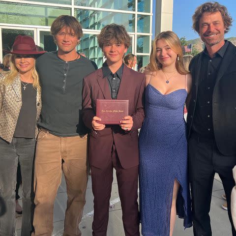 <p>Mira Sorvino Instagram</p> Mira Sorvino and Christopher Backus with their kids, Mattea, Johnny, and Holden.