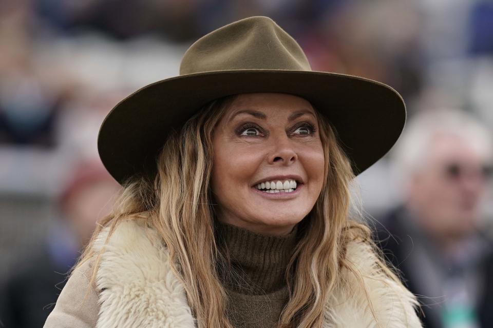 CHEPSTOW, WALES - MARCH 21: TV personality Carol Vorderman cheers home her her horse Subway Surf as it wins The Irish Thoroughbred Marketing Mares' Standard Open NH Flat Race at Chepstow Racecourse on March 21, 2019 in Chepstow, Wales. (Photo by Alan Crowhurst/Getty Images)