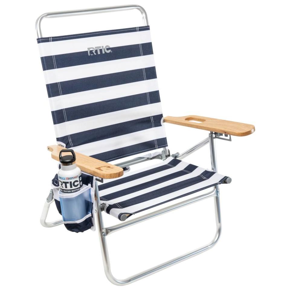 <p><a href="https://go.redirectingat.com?id=74968X1596630&url=https%3A%2F%2Frticoutdoors.com%2FBeach-Chair%3Fcolor%3DHamptons%26gclid%3DCj0KCQiA09eQBhCxARIsAAYRiykhelxIW11Ff5jq1dxFHebThxkB8Nu9eog63wkLBHNgBTCaLnphSA4aAiB9EALw_wcB&sref=https%3A%2F%2Fwww.cosmopolitan.com%2Flifestyle%2Fg39188601%2Fbest-beach-chairs%2F" rel="nofollow noopener" target="_blank" data-ylk="slk:Shop Now;elm:context_link;itc:0;sec:content-canvas" class="link ">Shop Now</a></p><p>Striped Beach Chair</p><p>$64.99</p><p>rticoutdoors.com</p><span class="copyright">Courtesy</span>