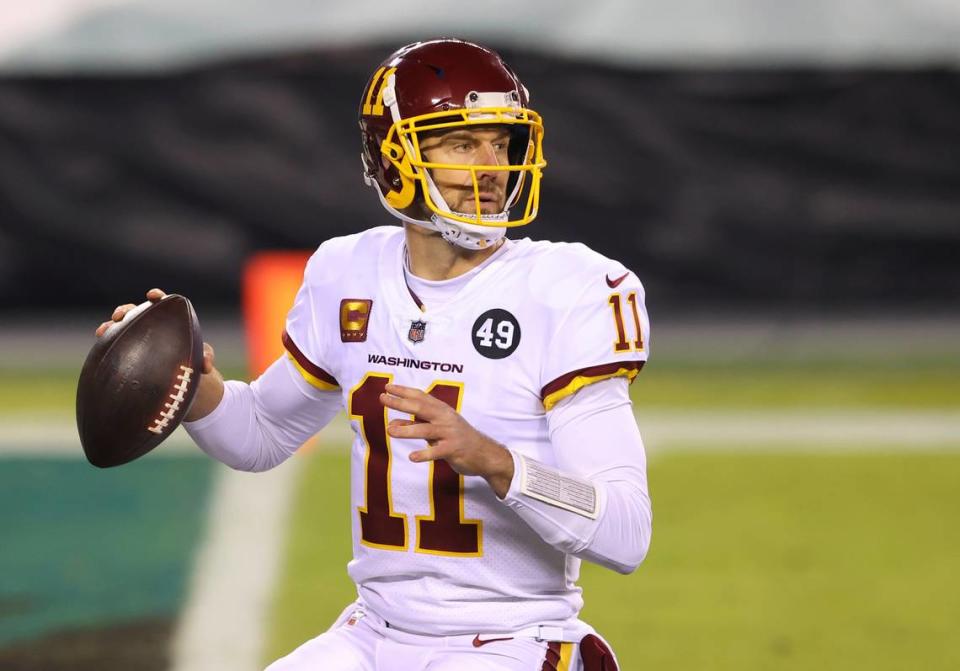 FILE - In this Jan. 3, 2021, file photo, Washington Football Team quarterback Alex Smith (11) prepares to throw against the Philadelphia Eagles during an NFL football game in Philadelphia. (AP Photo/Rich Schultz, FIle)