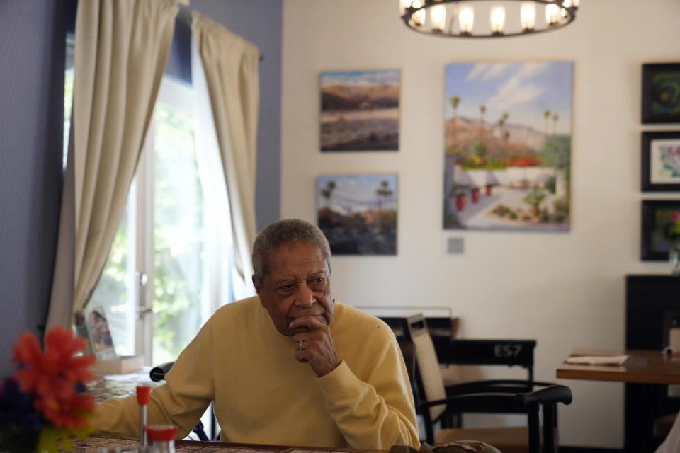 Lee Forte, a resident at Stonewall Gardens pauses while playing Bingo in the LGBTQ+ assisted living facility, Tuesday, Aug. 15, 2023, in Palm Springs, Calif. A handful of states, including California, have in recent years enacted laws to ensure that LGBTQ+ seniors have equal access to programs for aging populations and requiring training on how to serve that community. (AP Photo/Marcio Jose Sanchez)