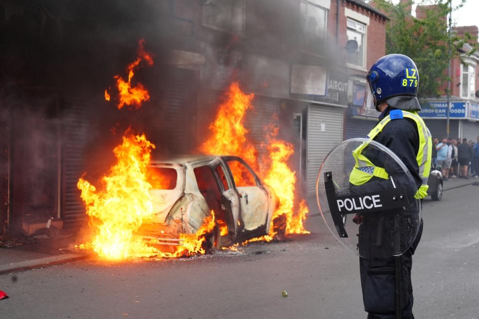 A car catches fire in Middlesbrough during an anti-immigration protest, August 4, 2024 (Owen Humphreys/PA Wire)