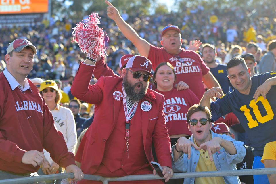 Jan 1, 2024; Pasadena, CA, USA; Fans cheer in the stands before the game between the Michigan Wolverines and the Alabama Crimson Tide in the 2024 Rose Bowl college football playoff semifinal game at Rose Bowl. Mandatory Credit: Jayne Kamin-Oncea-USA TODAY Sports