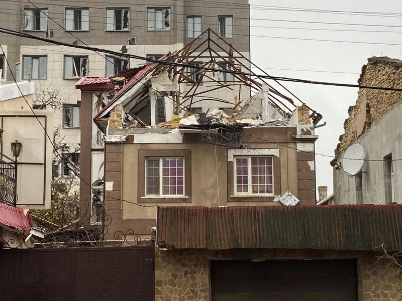 The remains of the Ninel Hotel, a hotel taken over by Russian security officials that was hit by the Ukrainian military, are seen in downtown Kherson