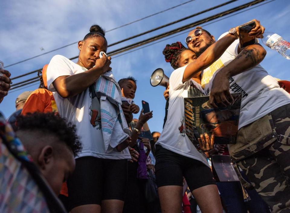 The families of four people killed in a mass shooting at a Juneteenth celebration two-years ago, joined the community in calling for justice at a memorial along Beatties Ford Road in Charlotte, N.C., on Wednesday, June 22, 2022.