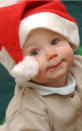 <b>Top 10 cute baby Christmas outfits </b><br><br>We wish we looked this good in a Santa hat.<br><br>© Rex