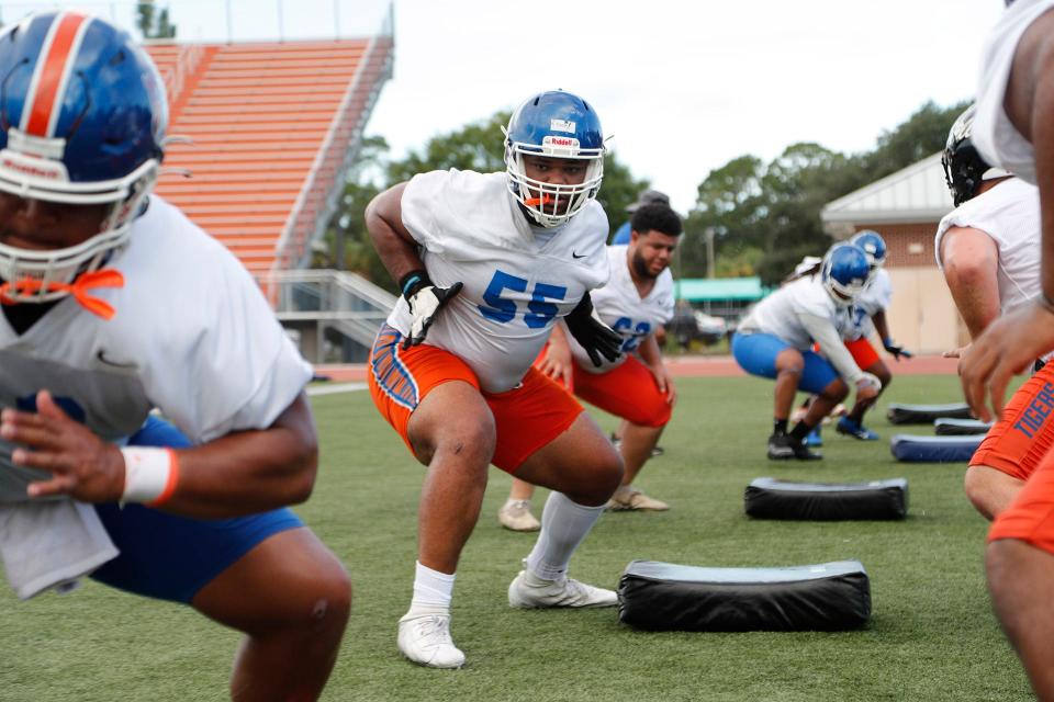 Savannah State offensive lineman Kyle Frazier (55) goes through blocking drills during practice Monday at T.A. Wright Stadium.