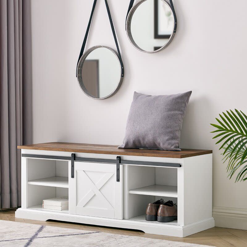 <p><a href="https://go.redirectingat.com?id=74968X1596630&url=https%3A%2F%2Fwww.wayfair.com%2Ffurniture%2Fpdp%2Fthree-posts-kemble-shoe-storage-bench-w003463857.html&sref=https%3A%2F%2F" rel="nofollow noopener" target="_blank" data-ylk="slk:Shop Now;elm:context_link;itc:0;sec:content-canvas" class="link ">Shop Now</a></p><p>Kosjo Storage Bench</p><p>wayfair.com</p><p>$199.99</p>