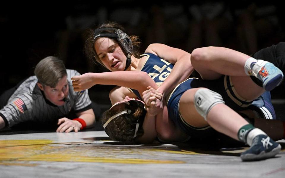 Bald Eagle Area’s Angelina Grieb controls Philipsburg-Osceola’s Charli Hunt in the 148 lb bout of the girls match on Thursday, Jan. 18, 2024.