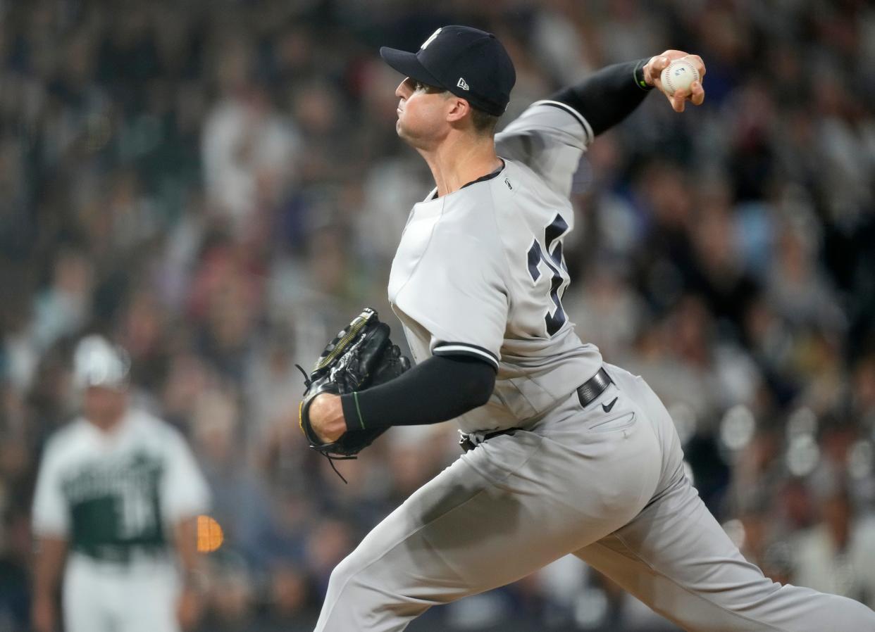 New York Yankees relief pitcher Clay Holmes works against the Colorado Rockies during the ninth inning of a baseball game Saturday, July 15, 2023, in Denver.(AP Photo/David Zalubowski)