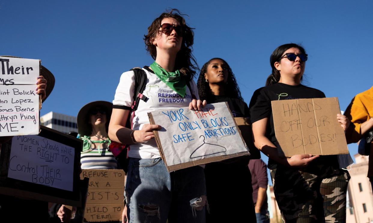 <span>Protesters attend a rally led by Women's March Tucson after Arizona's supreme court revived a 1864 law that bans abortion in virtually all instances.</span><span>Photograph: Rebecca Noble/Reuters</span>