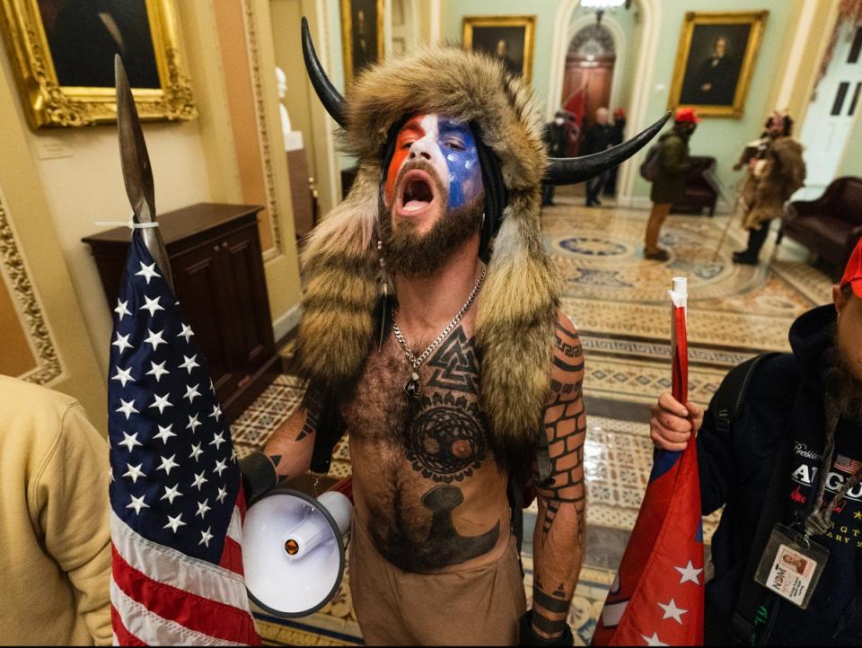 Jacob Chansley in the US Capitol (AP)