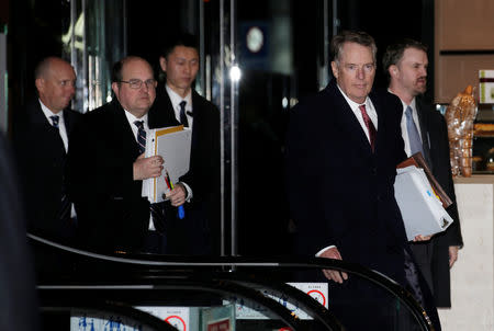 U.S. trade representative Robert Lighthizer (R), a member of the U.S. trade delegation to China, arrives at a hotel after talks with Chinese officials in Beijing, China February 14, 2019. REUTERS/Jason Lee