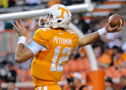 Oct 25, 2014; Knoxville, TN, USA; Tennessee Volunteers quarterback Nathan Peterman (12) warms up before the game against the Alabama Crimson Tide at Neyland Stadium. (Randy Sartin-USA TODAY Sports)