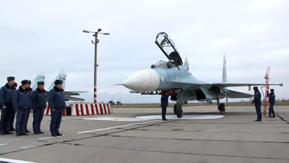 A Russian Su-27SM fighter arrives on the airfield at Belbek on November 26, 2014, soon after the annexation of Crimea. <em>Photo by YURIY LASHOV/AFP via Getty Images</em>