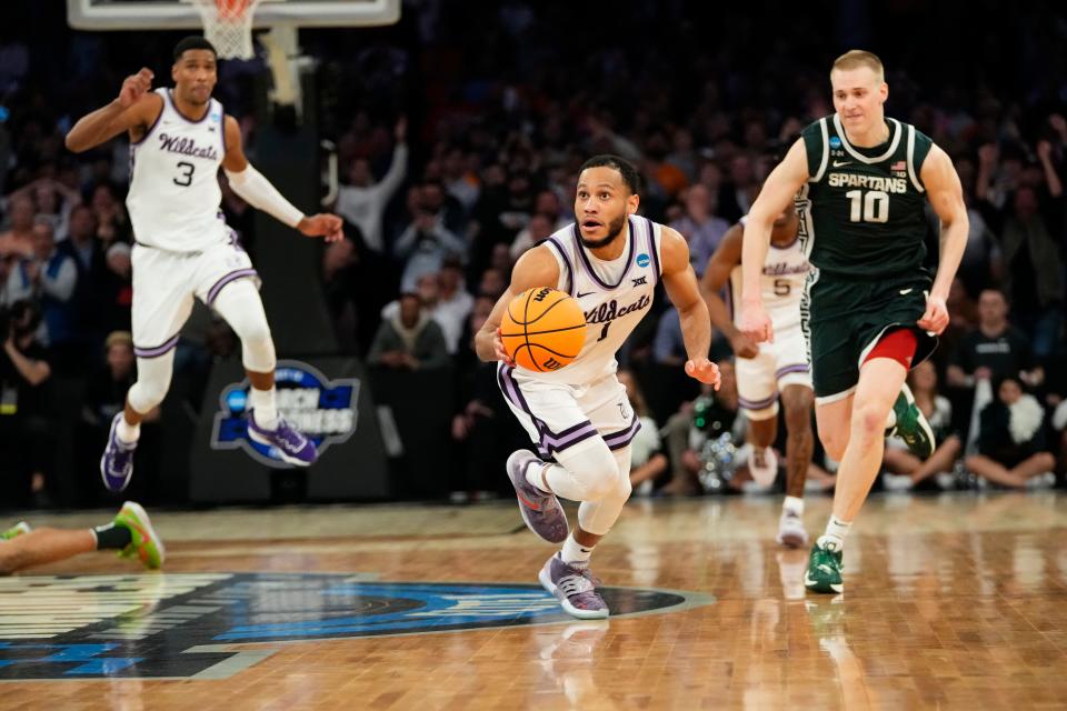 Kansas State guard Markquis Nowell (1) steals the ball from Michigan State forward Malik Hall in overtime of a Sweet 16 college basketball game in the East Regional of the NCAA tournament at Madison Square Garden, Thursday, March 23, 2023, in New York. (AP Photo/Frank Franklin II)