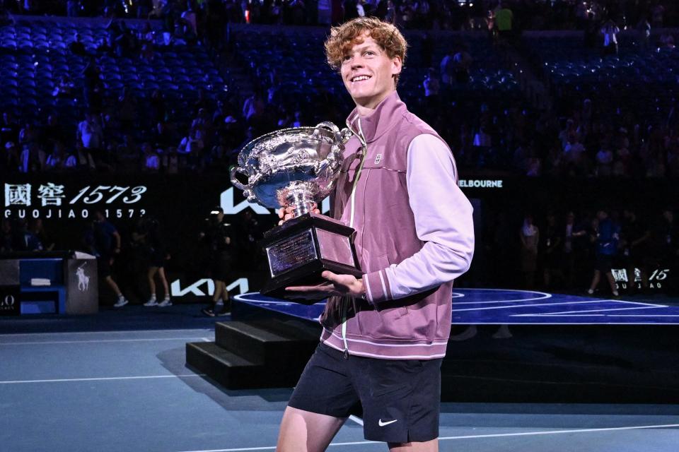 Italy's Jannik Sinner after his victory against Russia's Daniil Medvedev during their men's singles final match in the Australian Open tennis tournament in Melbourne on January 28, 2024.