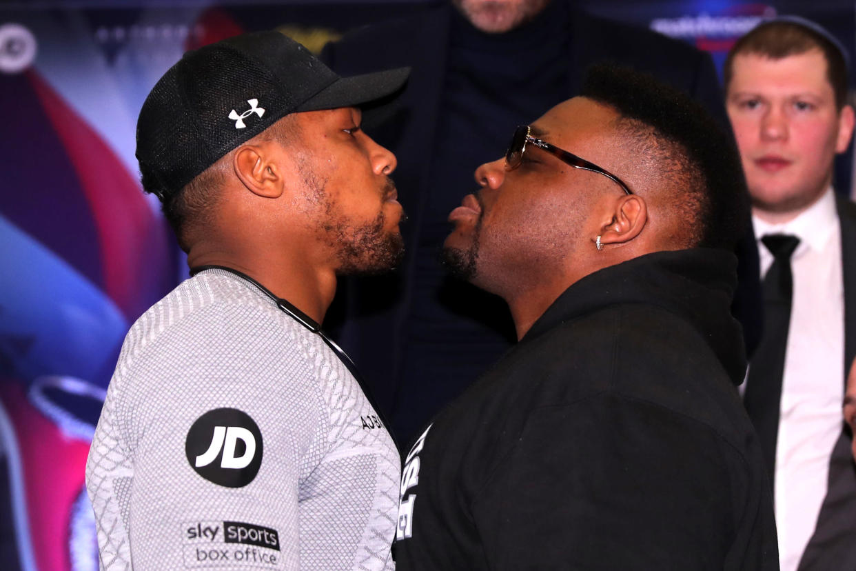 LONDON, ENGLAND - FEBRUARY 25: Anthony Joshua and Jarrell Miller square up during an Anthony Joshua and Jarrell Miller Press Conference ahead of their fight in June 2019 for the IBF, WBA and WBO heavyweight titles at Hilton London Syon Park on February 25, 2019 in London, England. (Photo by Richard Heathcote/Getty Images)