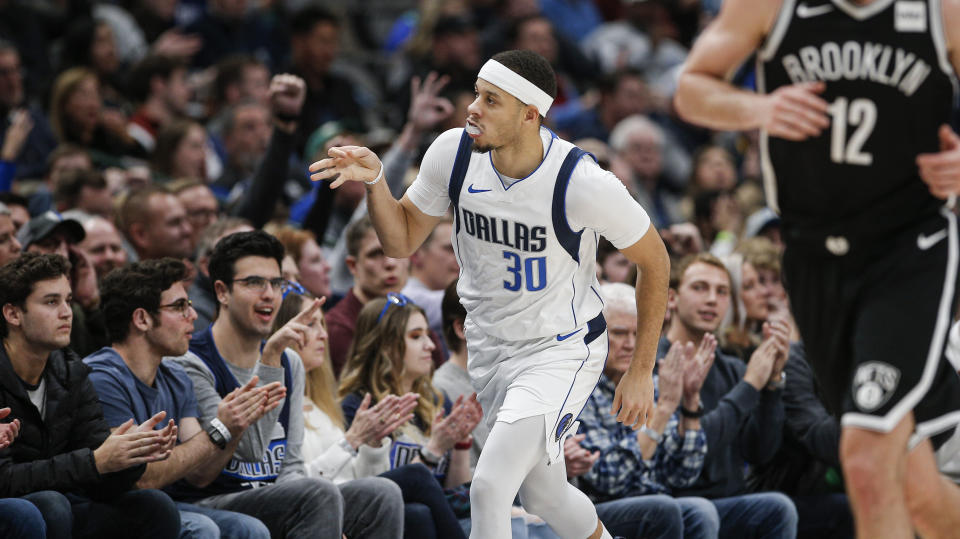 Dallas Mavericks guard Seth Curry (30) celebrates a 3-point shot during the second half of the team's NBA basketball game against the Brooklyn Nets on Thursday, Jan. 2, 2020, in Dallas. (AP Photo/Brandon Wade)