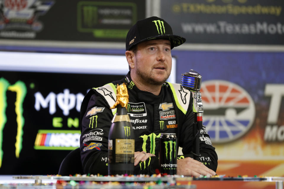 Kurt Busch responds to questions about his new multi-year contract with Chip Ganassi Racing during a NASCAR news conference at Texas Motor Speedway in Fort Worth, Texas, Saturday, Nov. 2, 2019. (AP Photo/Roger Steinman)