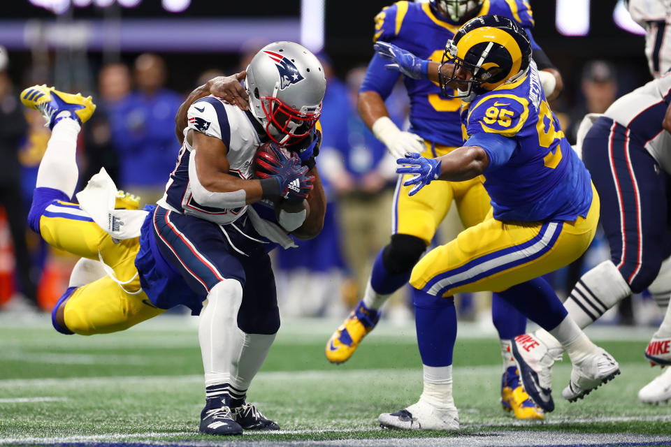 <p>James White #28 of the New England Patriots runs the ball against the Los Angeles Rams first quarter during Super Bowl LIII at Mercedes-Benz Stadium on February 03, 2019 in Atlanta, Georgia. (Photo by Maddie Meyer/Getty Images) </p>