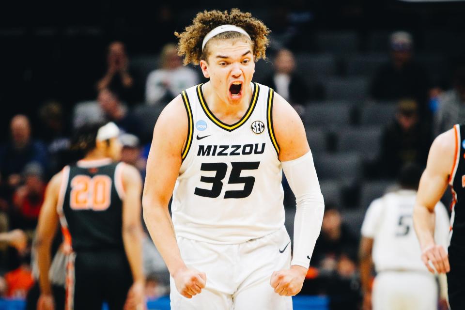 Missouri forward Noah Carter flexes in celebration after a play against Princeton in the Second Round of the NCAA Tournament on March 18, 2023, in Sacramento, Calif.