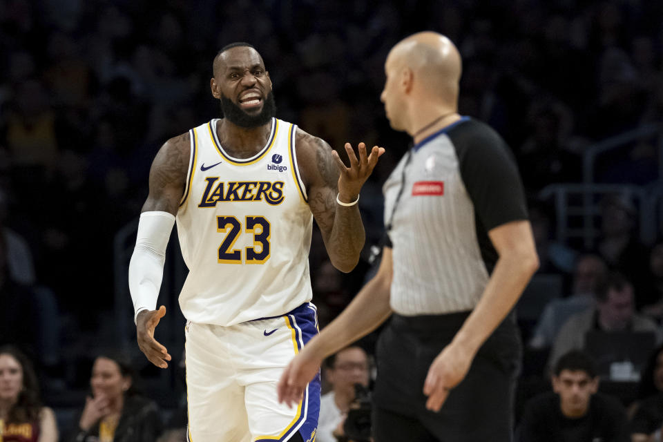 Los Angeles Lakers forward LeBron James (23) reacts after being called for a foul during the second half of an NBA basketball game against the Cleveland Cavaliers, Saturday, April 6, 2024, in Los Angeles. (AP Photo/William Liang)