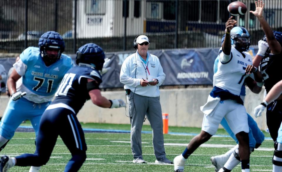 URI head coach Jim Fleming watches the performance of both his offense and defense during their spring scrimmage at Meade Stadium on Saturday morning.