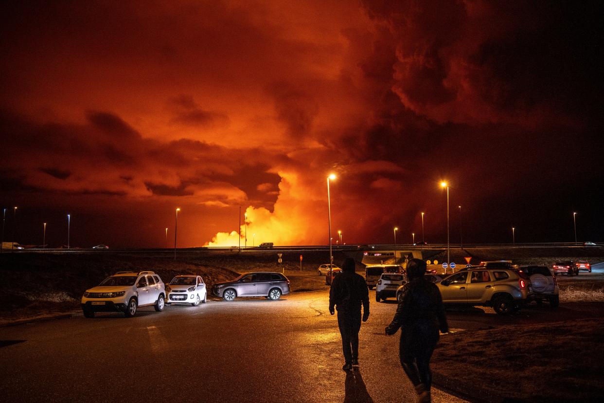 Plumes of smoke rise from volcanic activity between Hagafell and Stóri-Skógfell, Iceland, on Saturday, March 16, 2024. (AP Photo/Marco di Marco) ORG XMIT: ILMM107