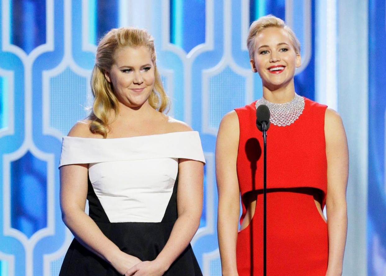 BFFs Amy Schumer and Jennifer Lawrence are going through changes since Schumer's baby was born. (Photo: Handout via Getty Images)