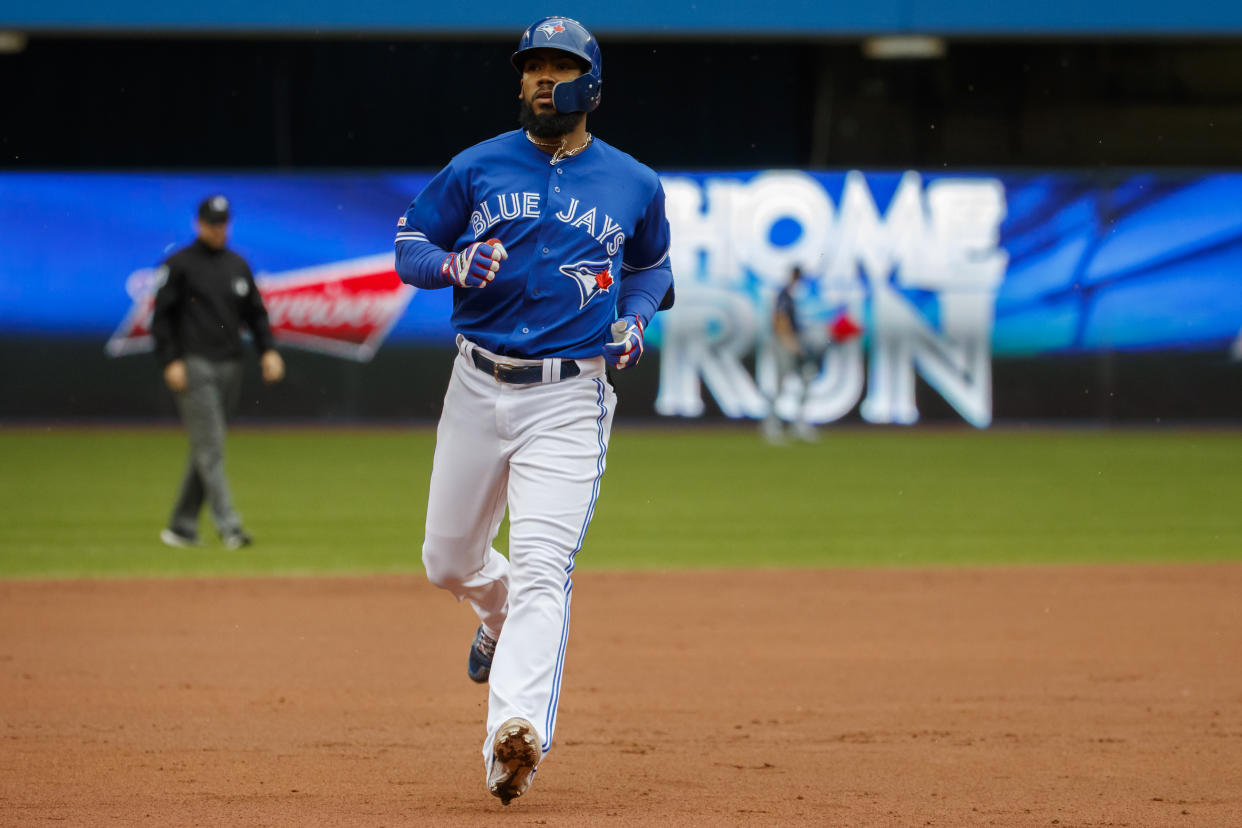 TORONTO, ON - SEPTEMBER 28: Teoscar Hernandez #37 of the Toronto Blue Jays rounds third base as he hits a solo home run during first inning of their MLB game against the Tampa Bay Rays Rogers Centre on September 28, 2019 in Toronto, Canada. (Photo by Cole Burston/Getty Images)