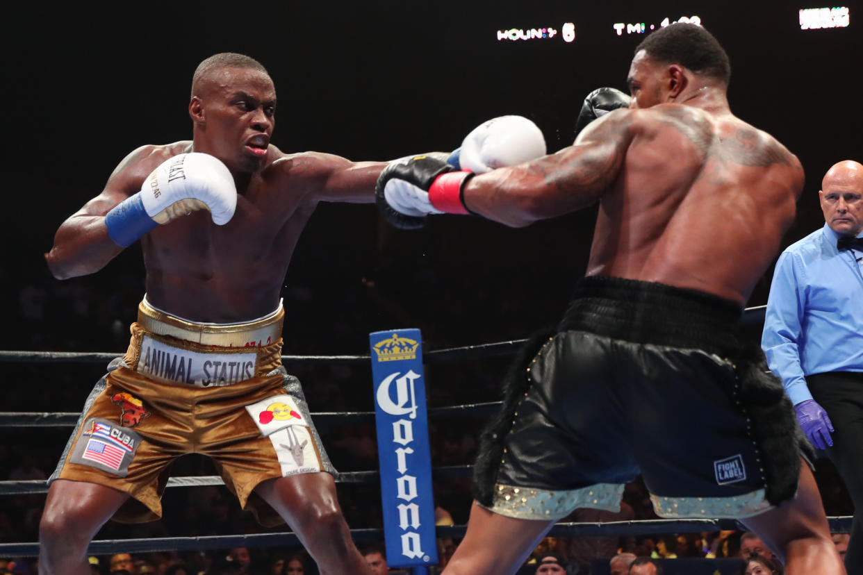 UNIONDALE, NY - AUGUST 04: Peter Quillin (l) lands a left hand against JLeon Love. Quillin would win by unanimous decision at the Nassau Veterans Memorial Coliseum on August 4, 2018 in Uniondale, New York. (Photo by Edward Diller/Getty Images)