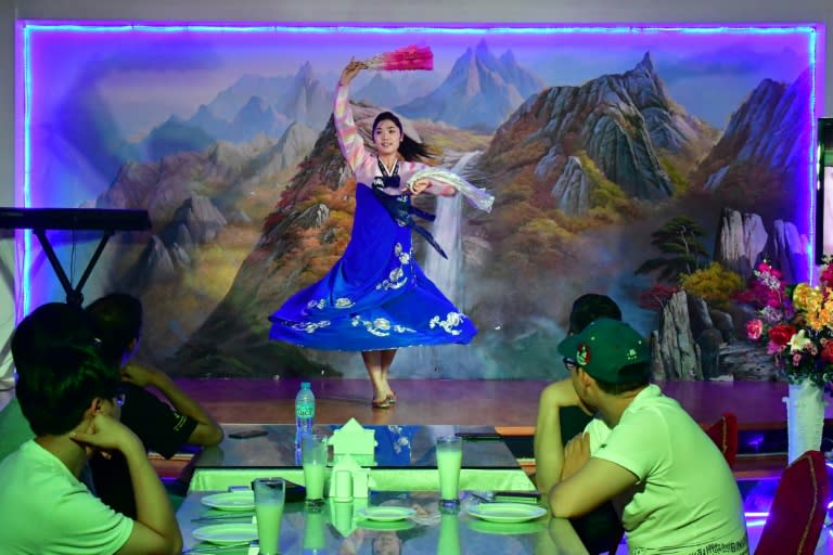 A dancer performs for patrons at Okryu-gwan, a North Korean restaurant in Dubai