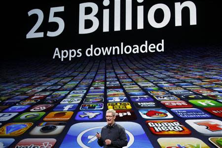 Apple CEO Tim Cook speaks about the number of Apps downloaded during an Apple event in San Francisco, California in this file photo from March 7, 2012. REUTERS/Robert Galbraith/Files
