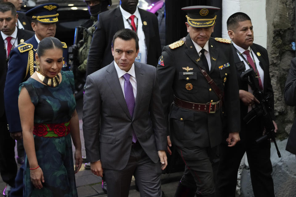 Ecuador's President Daniel Noboa arrives to the National Electoral Council to officially open voting for a referendum seeking support for new security measures to combat rising violence, in Quito, Ecuador, Sunday, April 21, 2024. (AP Photo/Dolores Ochoa)