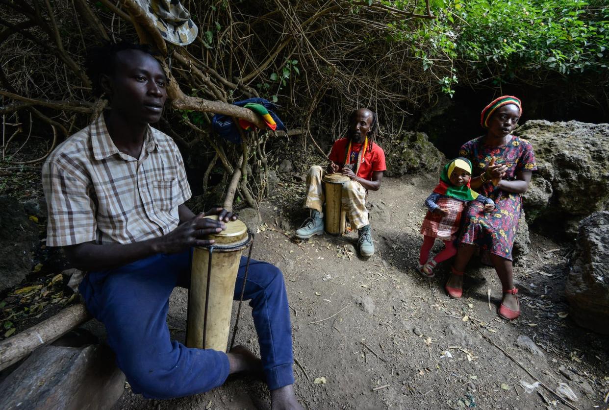 Rastafarians drum and sing during a special prayer and worship meeting at Menengai forest in Kenya. <a href="https://www.gettyimages.com/detail/news-photo/adherents-of-the-rastafari-sect-play-a-drum-and-sing-during-news-photo/1246795428?adppopup=true" rel="nofollow noopener" target="_blank" data-ylk="slk:James Wakibia/SOPA Images/LightRocket via Getty Images;elm:context_link;itc:0;sec:content-canvas" class="link ">James Wakibia/SOPA Images/LightRocket via Getty Images</a>