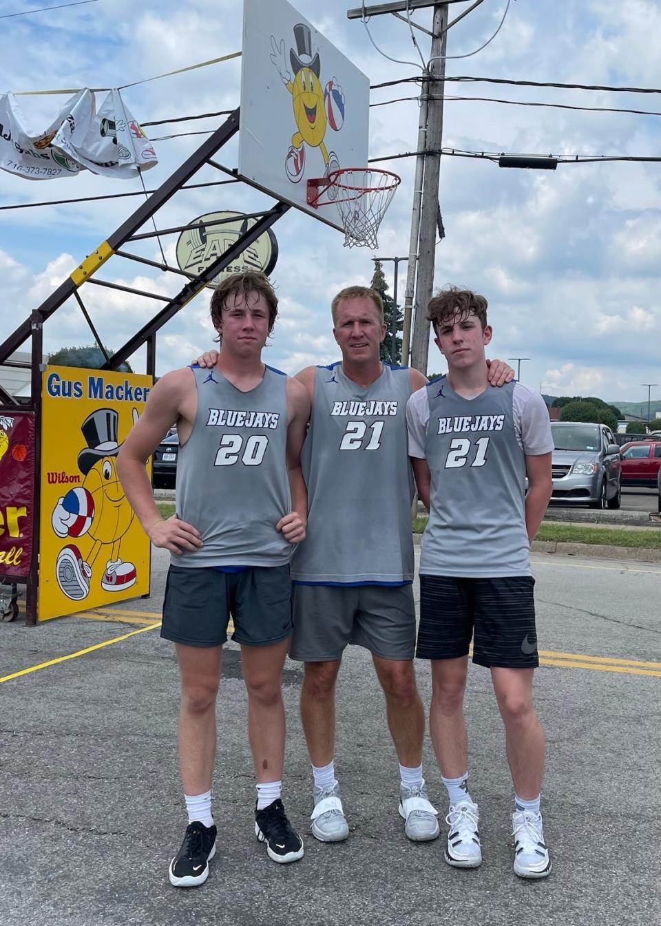 The ties to the Creighton run so strong in the Halligan family that (from left) Zach, his father, Dennis, and brother, Ty, played as Bluejays together. That ends Thursday for a few hours when Akron wing Zach takes on his dad's alma mater in the NCAA Tournament.
