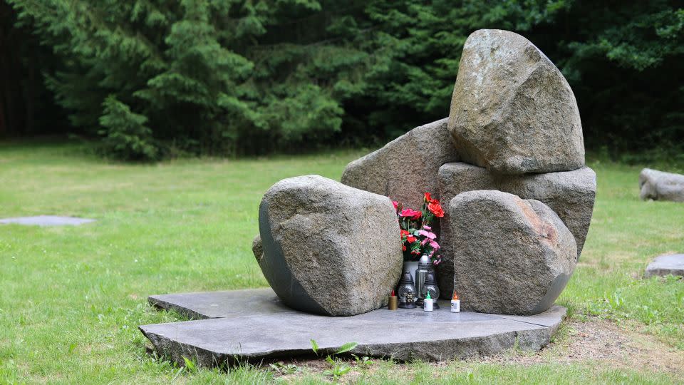 A modest memorial sculpture was unveiled near the camp's burial grounds in 1995. - Ivana Kottasova/CNN